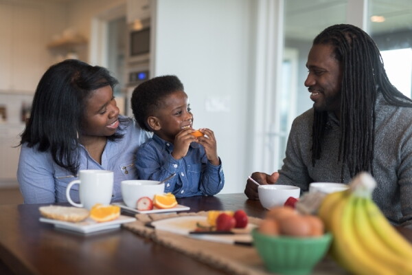 A family eating fruit together