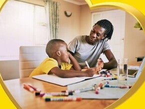 An adult teaches a child