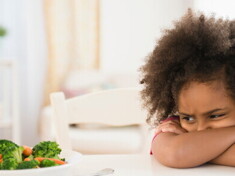 A child refusing eating vegetables