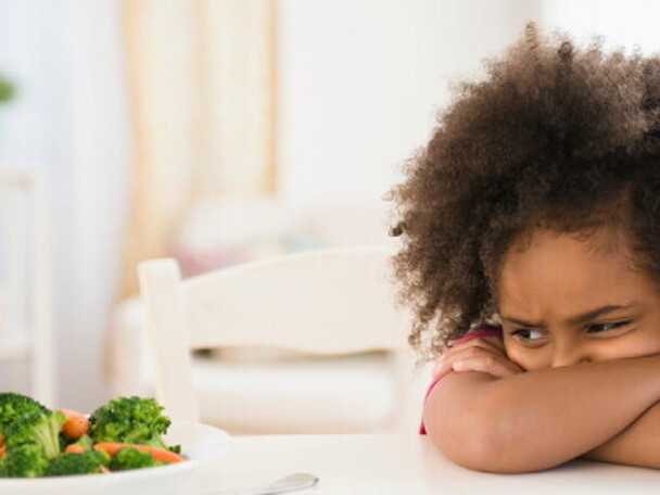 A child refusing eating vegetables