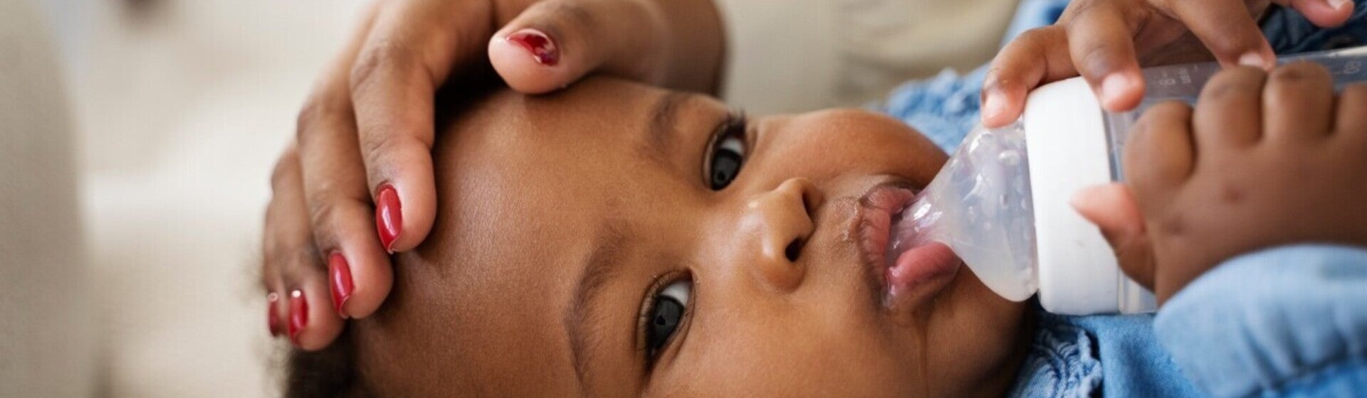 black mother taking car her child